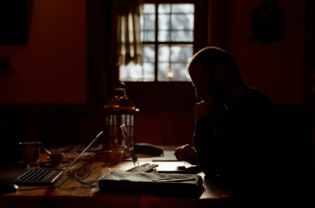 mysterious writer at desk