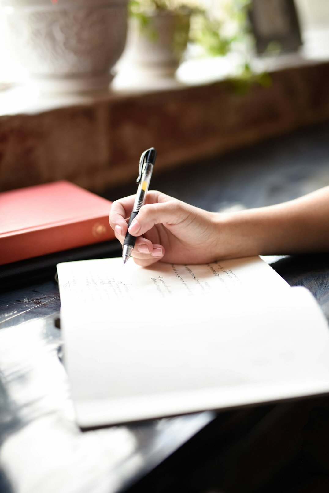 author writing notes